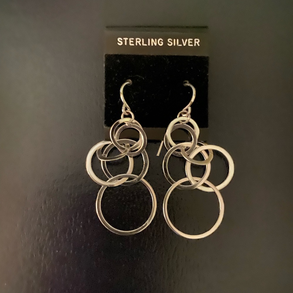 Silver circle dangling earrings